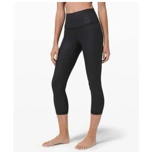 Lululemon Athletica Black Cropped Stride Embossed High Rise Leggings, size 4
